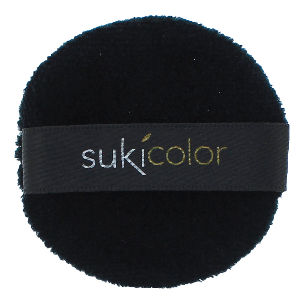 cream color applicator/puff